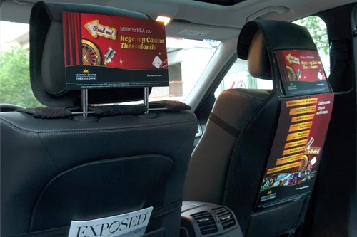 Headrest advertising inside taxis in Delhi targeting captive commuter audiences
