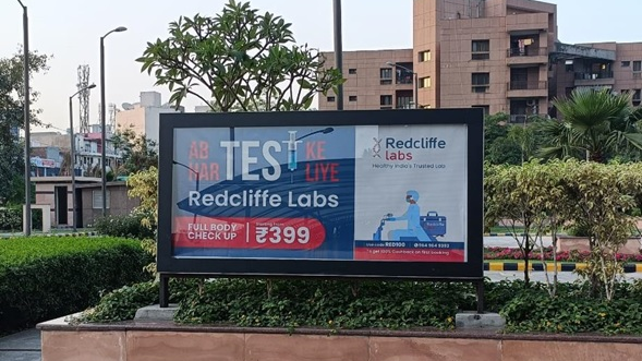 Redcliffe Labs health checkup billboard campaign in India Redcliffe Labs outdoor billboard advertising full body checkup offer in urban residential area India