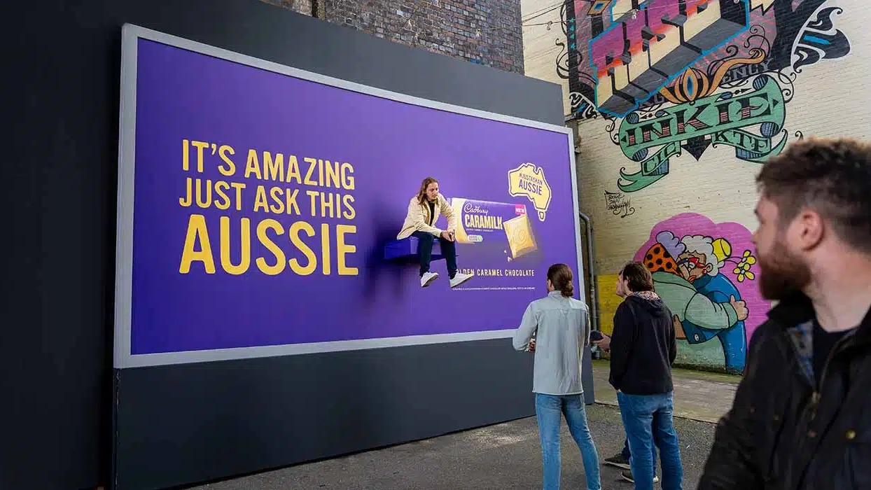 Cadbury Caramilk Interactive Billboard Campaign Cadbury Caramilk billboard featuring interactive human element and immersive outdoor advertising