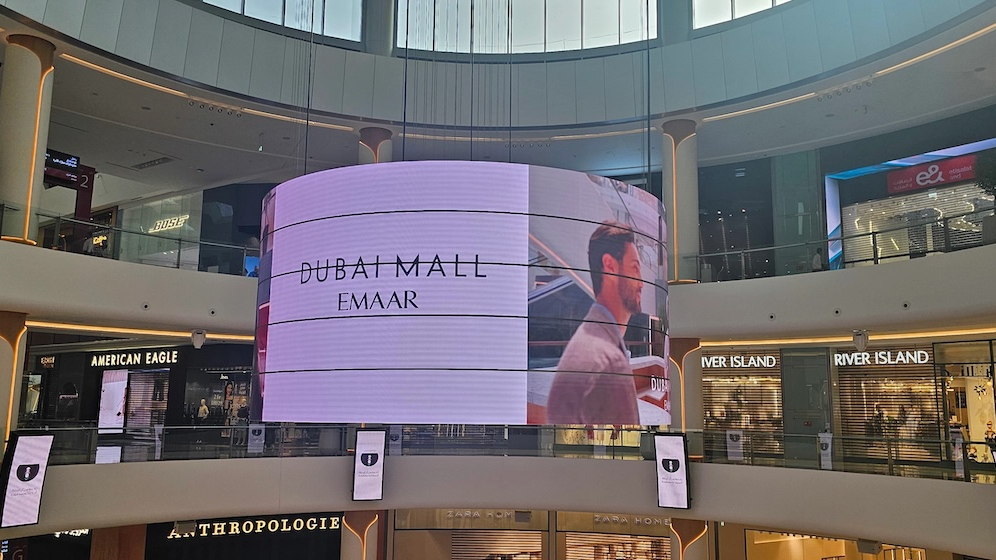 large digital LED screen advertising inside shopping mall atrium with high visibility