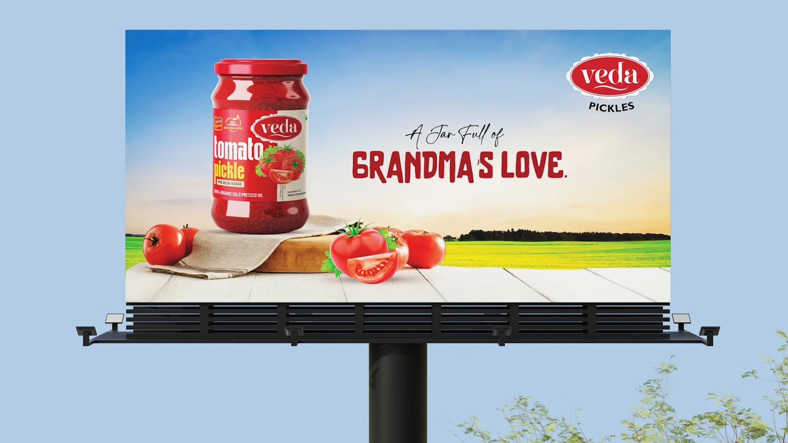 Veda tomato pickle billboard with product display and brand message showcasing outdoor advertising