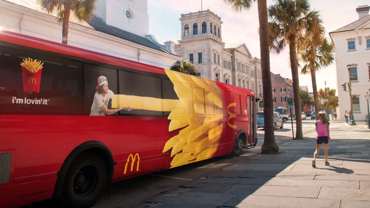 McDonald’s bus branding campaign with creative fries visual on public transport vehicle